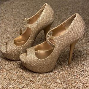 Gold sparkly stilettos